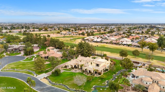 birds eye view of property with a residential view and golf course view