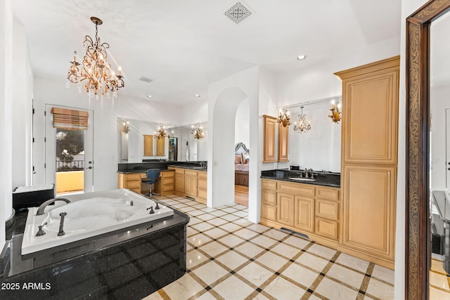 full bathroom featuring a chandelier, recessed lighting, two vanities, a sink, and visible vents