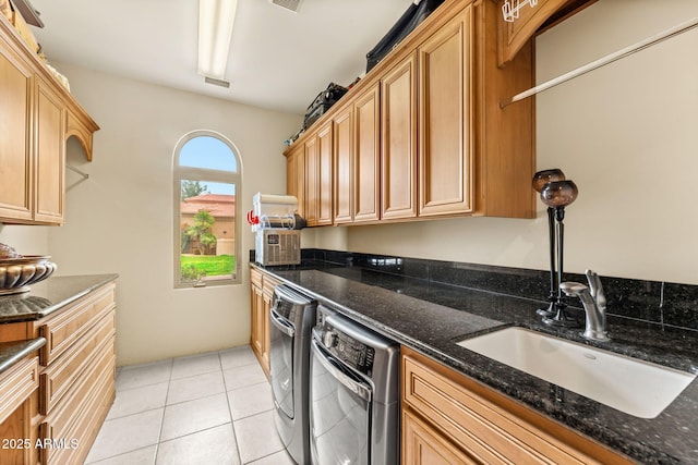 kitchen with light tile patterned floors, dark stone counters, visible vents, dishwasher, and open shelves