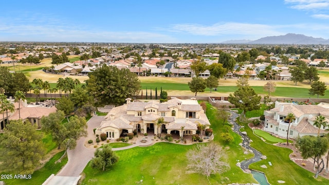 birds eye view of property featuring a residential view, a mountain view, and golf course view