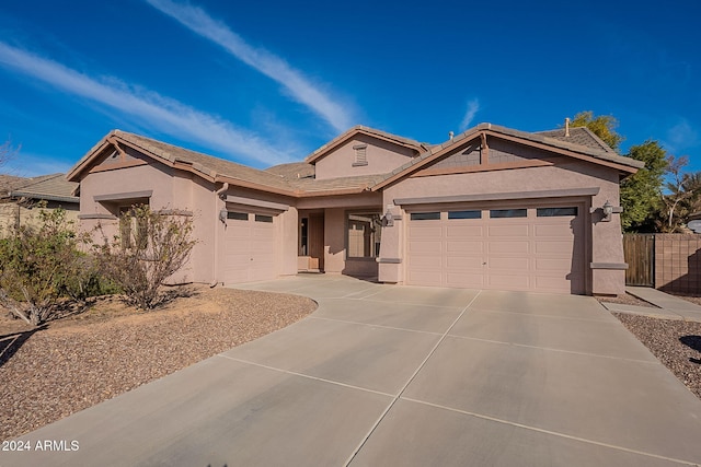 single story home featuring a garage