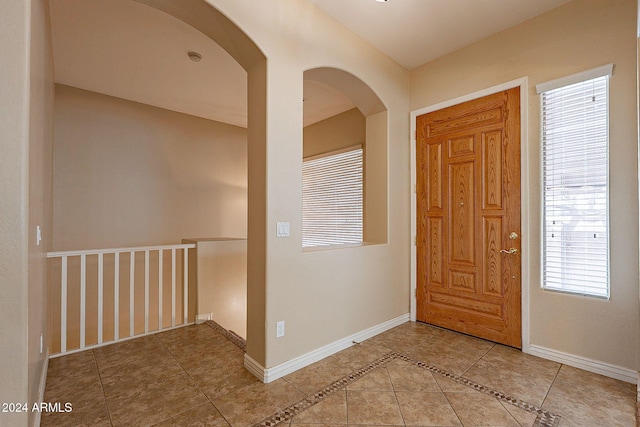 entrance foyer featuring tile patterned floors