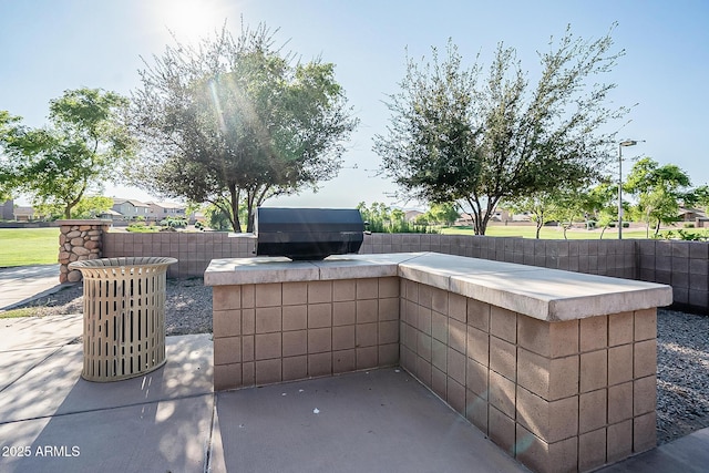 view of patio / terrace featuring a grill