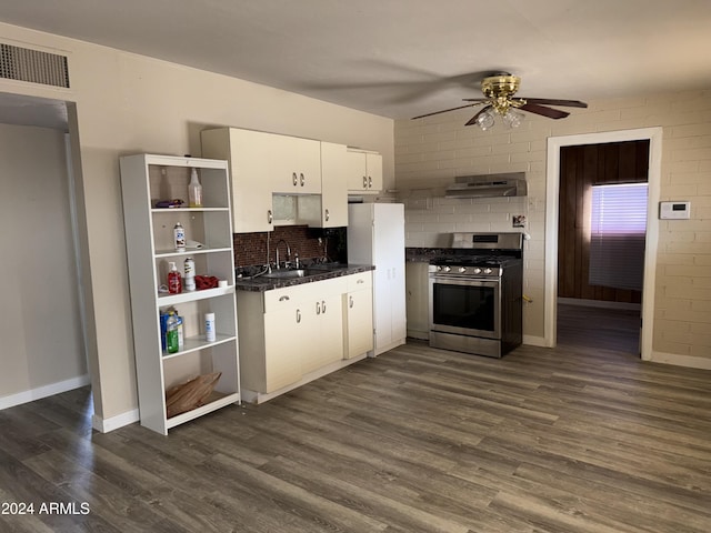 kitchen with white cabinets, sink, ceiling fan, dark hardwood / wood-style flooring, and stainless steel range with gas stovetop