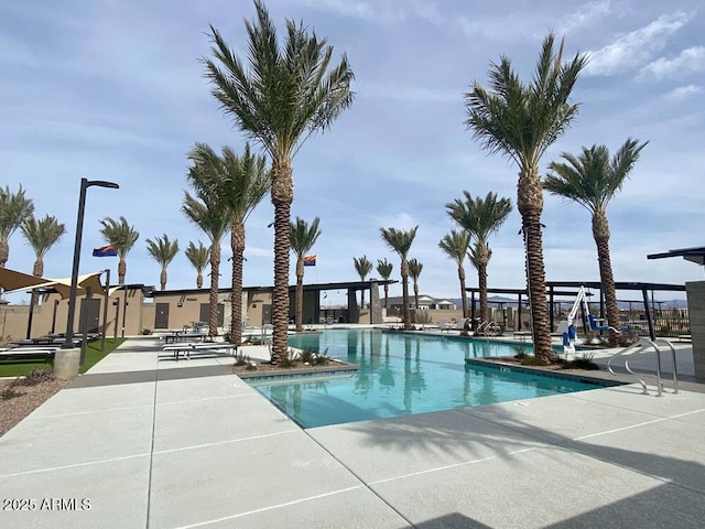 pool with a patio area