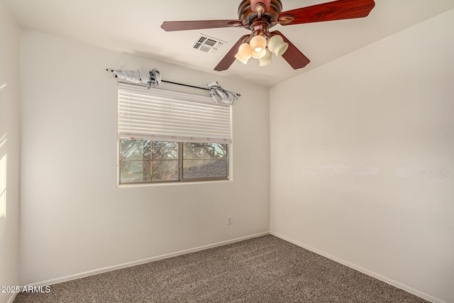 unfurnished room with a ceiling fan, carpet, visible vents, and baseboards