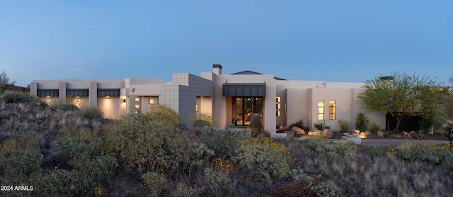 view of front of property featuring stucco siding