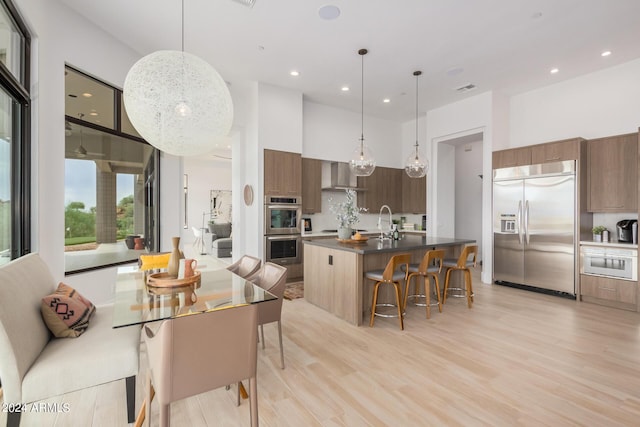 interior space featuring recessed lighting, visible vents, and light wood finished floors