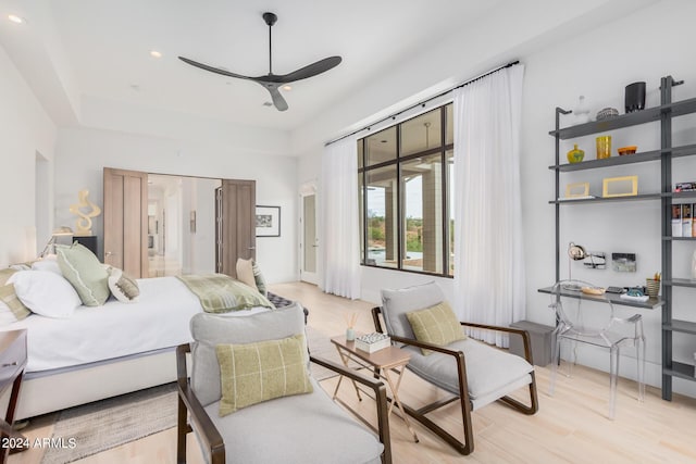 bedroom with recessed lighting, access to outside, ceiling fan, and light wood finished floors