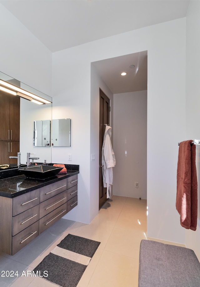 bathroom featuring tile patterned floors, recessed lighting, and vanity