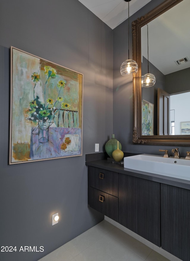 bathroom featuring visible vents and vanity