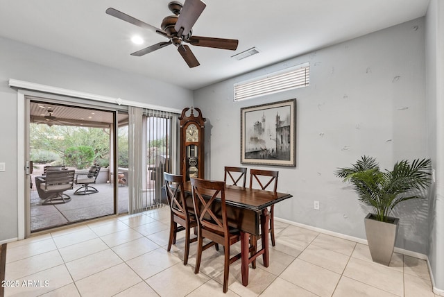 20450 N Shadow Mountain Dr, Surprise, AZ 85374 - dining area featuring plenty of natural light, a ceiling fan, light tile patterned flooring, and baseboards