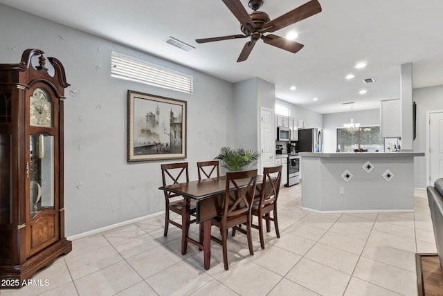 20450 N Shadow Mountain Dr, Surprise, AZ 85374 - dining area with a ceiling fan, light tile patterned floors, a chandelier, recessed lighting, and baseboards