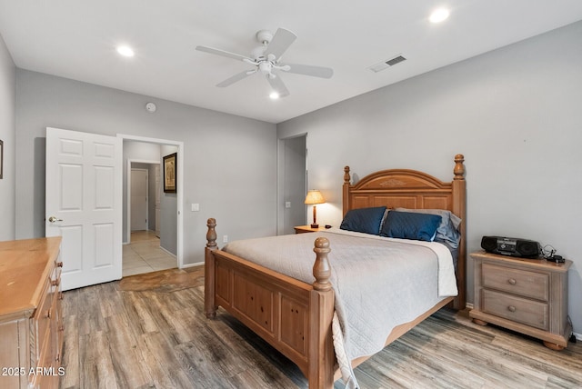 20450 N Shadow Mountain Dr, Surprise, AZ 85374 - bedroom with light wood-style floors, a ceiling fan, recessed lighting, and baseboards