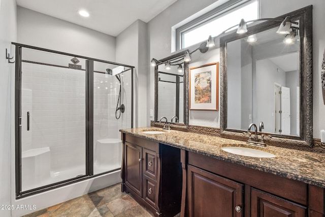20450 N Shadow Mountain Dr, Surprise, AZ 85374 - bathroom featuring a shower stall, stone finish flooring, and double vanity