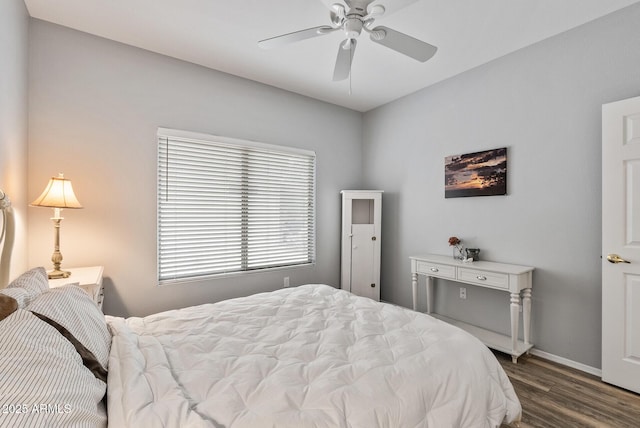 20450 N Shadow Mountain Dr, Surprise, AZ 85374 - bedroom with dark wood-style floors, baseboards, and ceiling fan