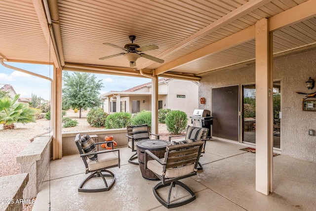 20450 N Shadow Mountain Dr, Surprise, AZ 85374 - view of patio / terrace featuring a ceiling fan and a fire pit