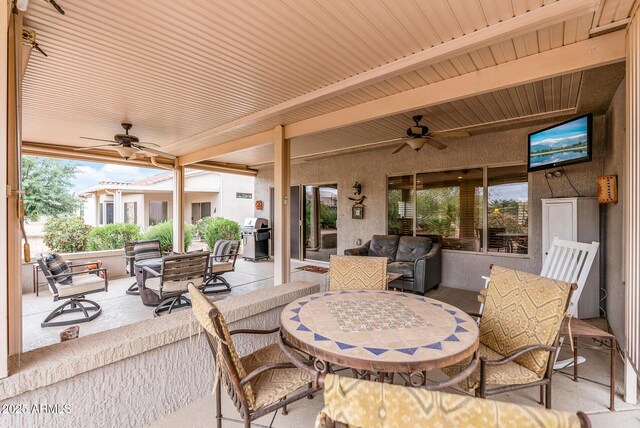 20450 N Shadow Mountain Dr, Surprise, AZ 85374 - view of patio featuring a ceiling fan, outdoor dining space, and an outdoor hangout area