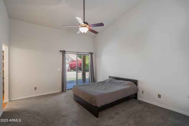 1226 E Greenway Cir, Mesa, AZ 85203 - bedroom featuring access to exterior, high vaulted ceiling, carpet floors, and baseboards
