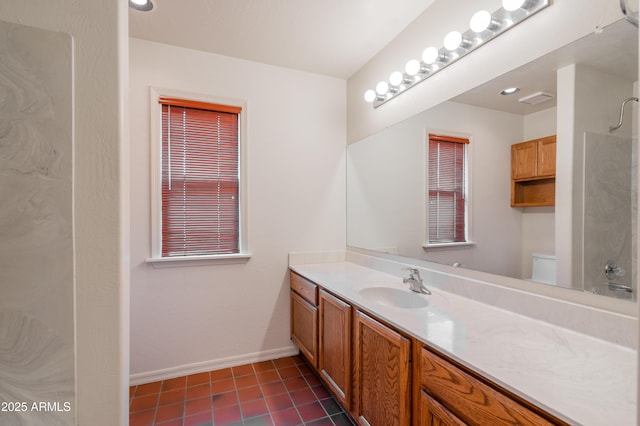 1226 E Greenway Cir, Mesa, AZ 85203 - bathroom featuring a shower, vanity, baseboards, tile patterned flooring, and toilet
