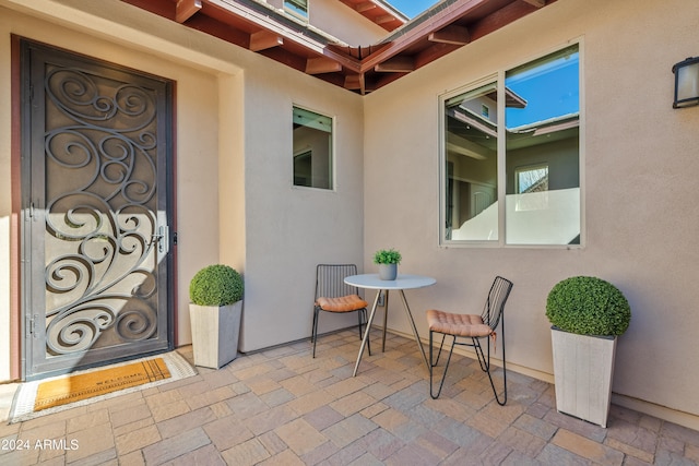 doorway to property featuring a patio