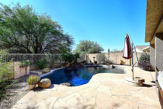 4321 E Desert Sky Ct, Cave Creek, AZ 85331 - view of pool featuring a fenced backyard, a fenced in pool, and a patio area