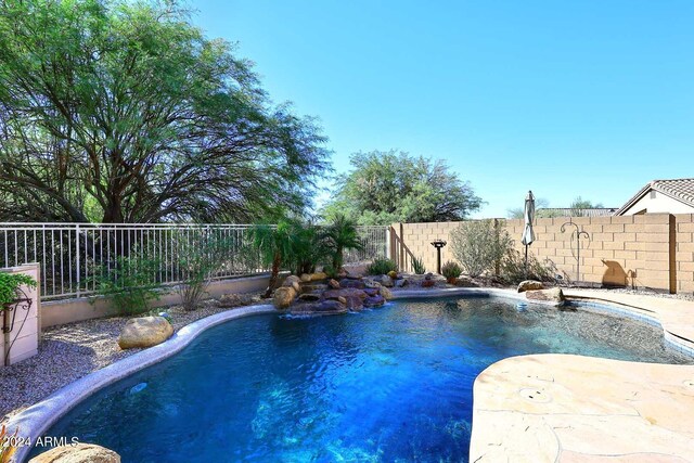 4321 E Desert Sky Ct, Cave Creek, AZ 85331 - view of swimming pool featuring a fenced in pool, a patio, and a fenced backyard
