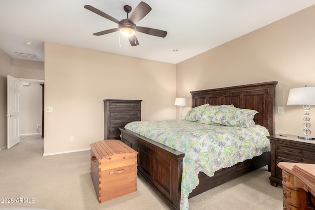 bedroom featuring ceiling fan, baseboards, and light colored carpet