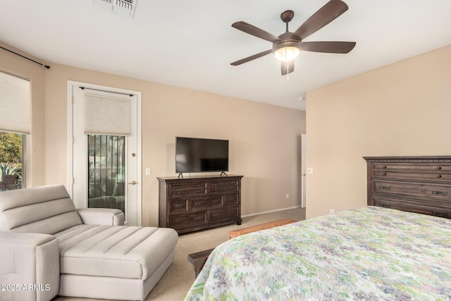 bedroom with baseboards, a ceiling fan, visible vents, and light colored carpet