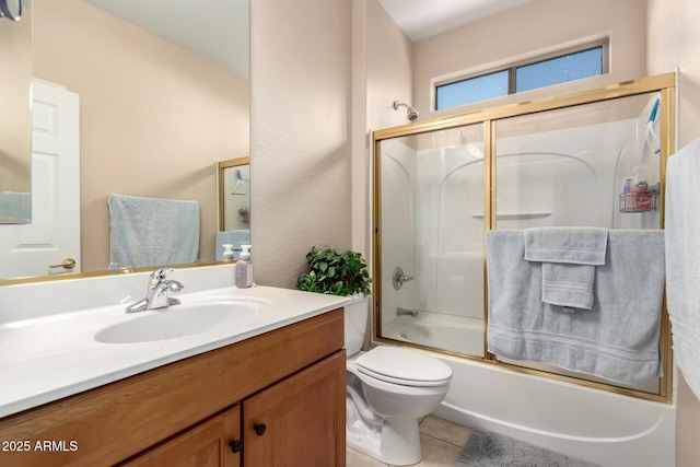 full bathroom with toilet, tile patterned floors, combined bath / shower with glass door, and vanity