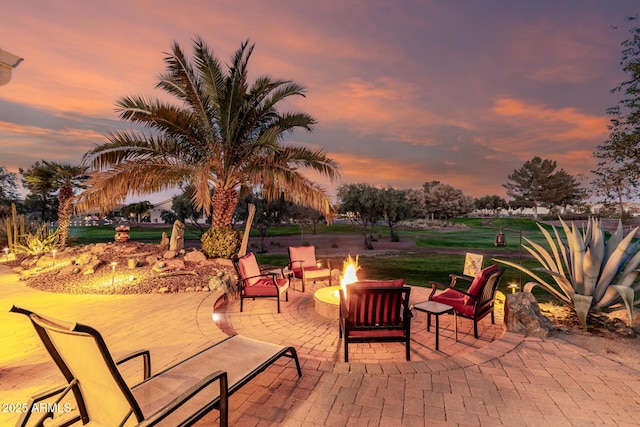 view of patio with a fire pit