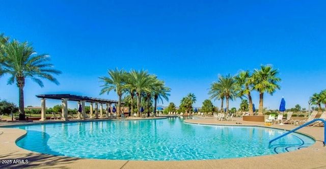 community pool featuring a patio area and a pergola