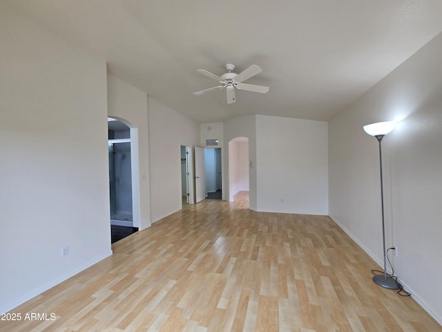 unfurnished living room with ceiling fan and light wood-type flooring