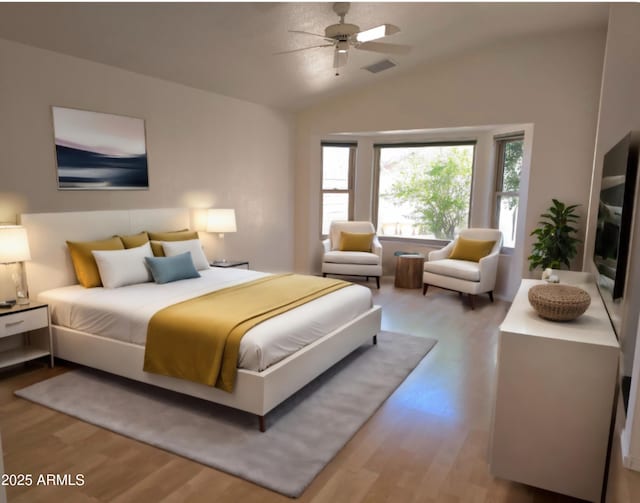 bedroom with ceiling fan, lofted ceiling, and light wood-type flooring