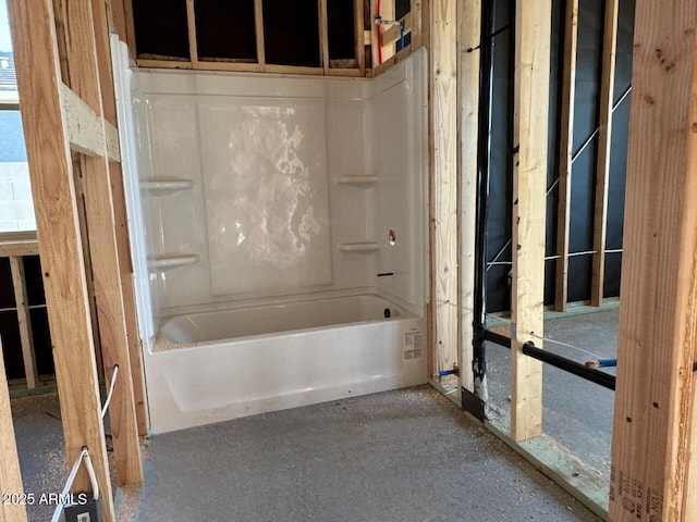 bathroom with a washtub