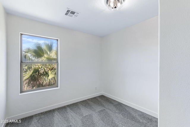1612 E Desert Rose Trl, San Tan Valley, AZ 85143 - spare room featuring baseboards, visible vents, and carpet floors