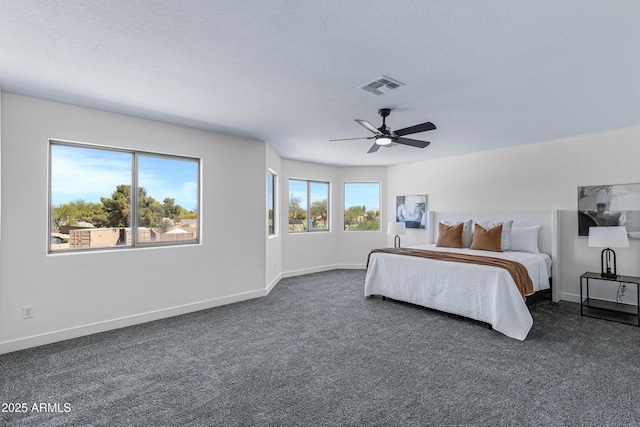 1612 E Desert Rose Trl, San Tan Valley, AZ 85143 - bedroom featuring baseboards, dark colored carpet, and visible vents