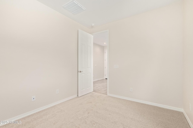 empty room with light carpet