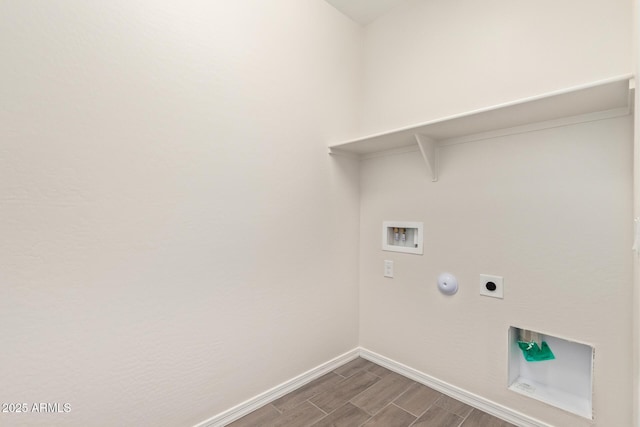 laundry room featuring gas dryer hookup, hookup for an electric dryer, and washer hookup