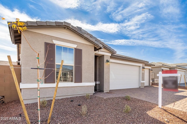 view of front of home featuring a garage