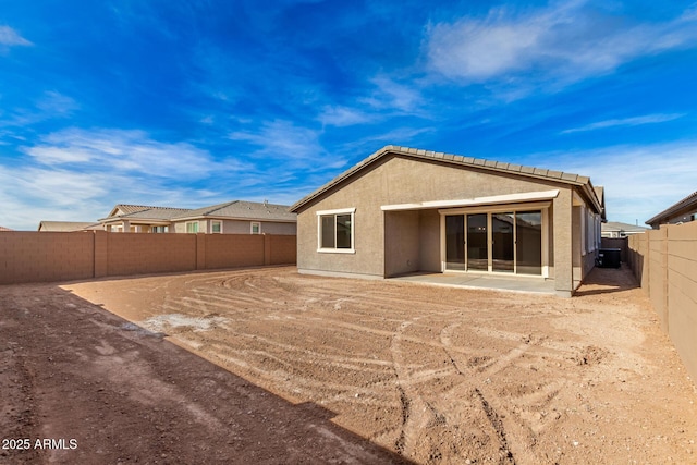 back of house featuring a patio