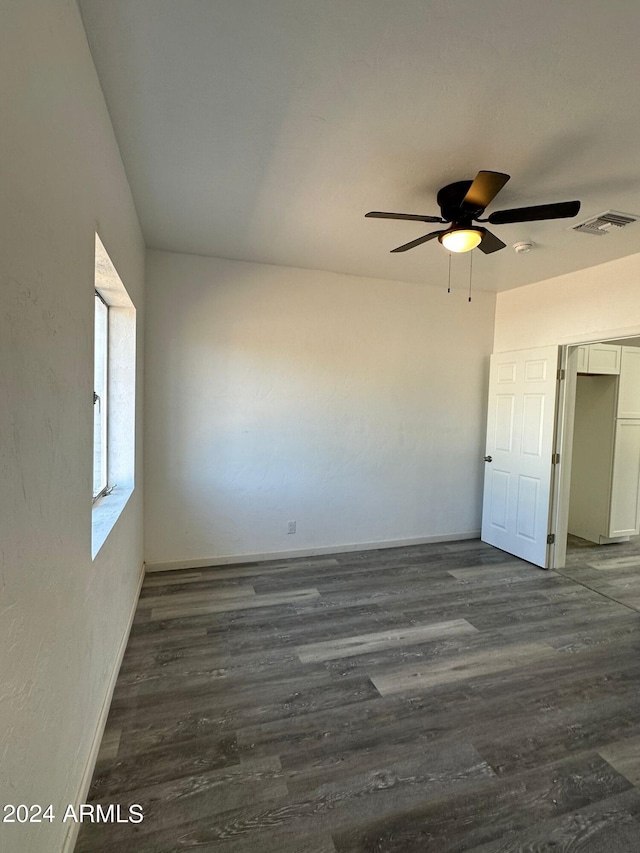 interior space with hardwood / wood-style floors and ceiling fan