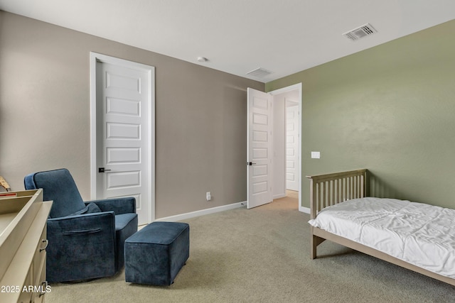 bedroom with light carpet, visible vents, and baseboards