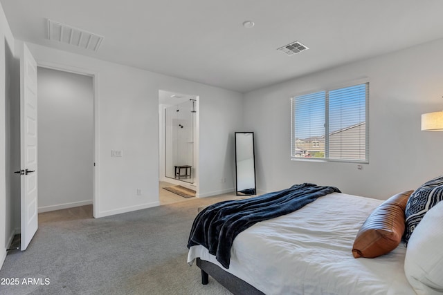 bedroom featuring baseboards, visible vents, and carpet flooring