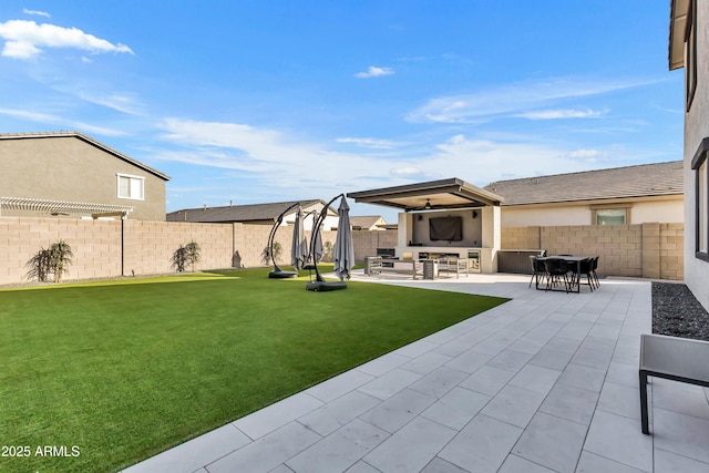 view of yard featuring outdoor dining area, a fenced backyard, outdoor lounge area, and a patio