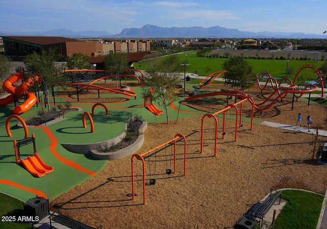 community playground featuring a mountain view