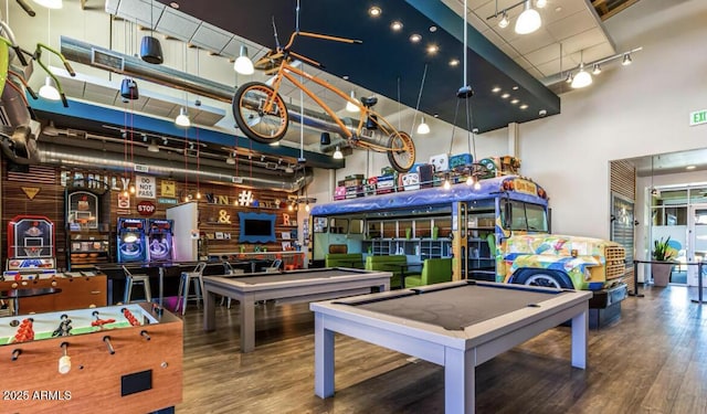 playroom with rail lighting, pool table, visible vents, a high ceiling, and wood finished floors