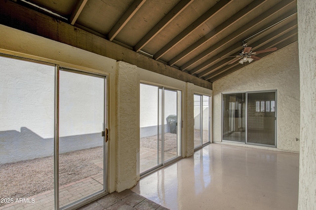 unfurnished sunroom with lofted ceiling with beams and ceiling fan