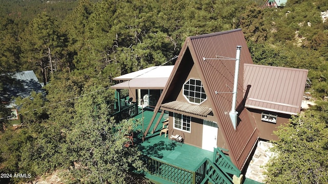 aerial view featuring a forest view