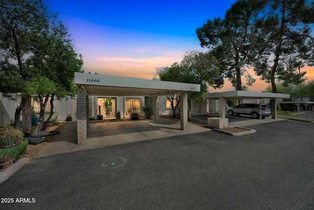 view of front of house with covered parking